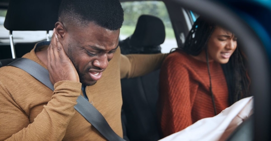Couple Involved In Car Crash With Male Driver Suffering With Whiplash Injury. Rockford, Illinois.