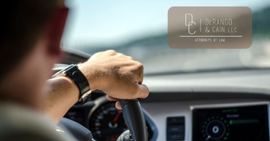 man driving and making a turn